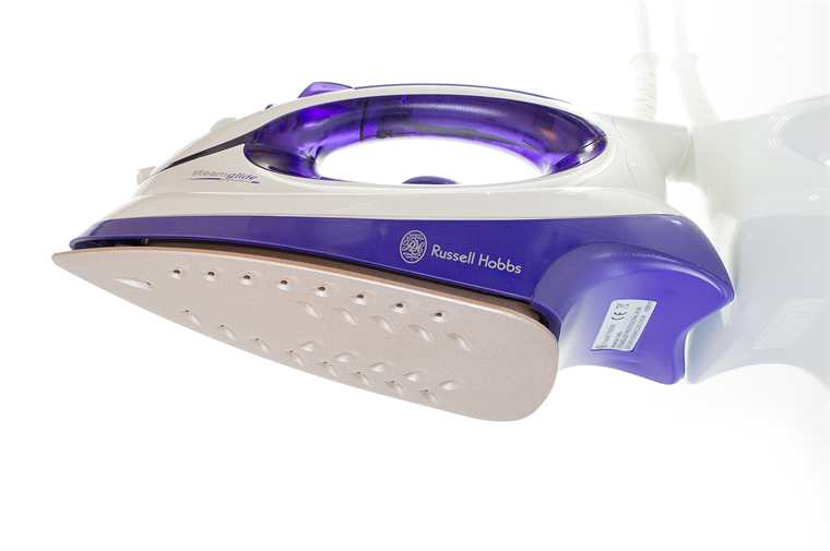 A hot steam iron ready for pressing