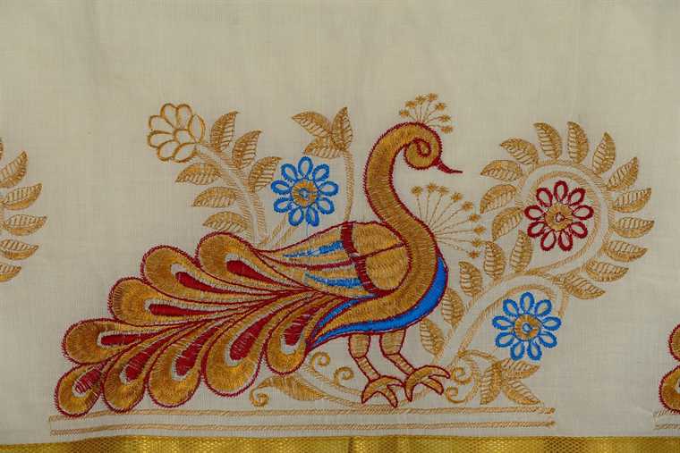 Close detail of embroidery on a silk saree