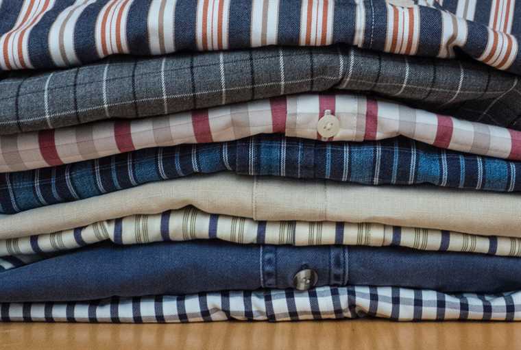 A neat stack of pressed shirts